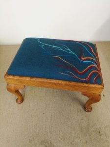 Footstool with needle felting